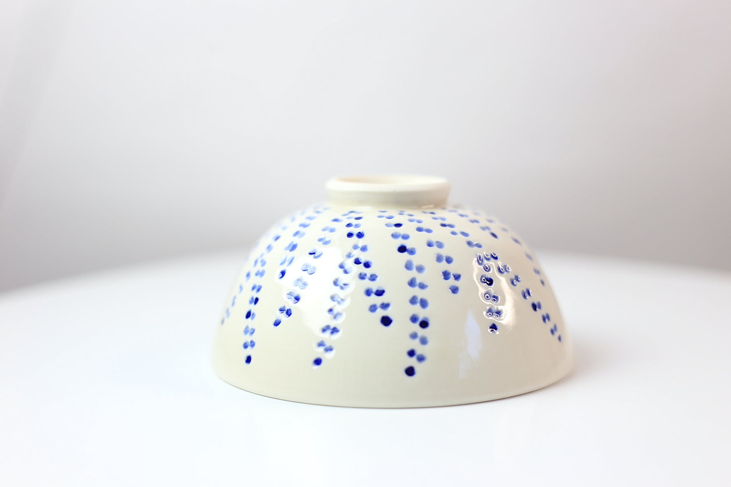 Hand-carved and painted medium porcelain bowl