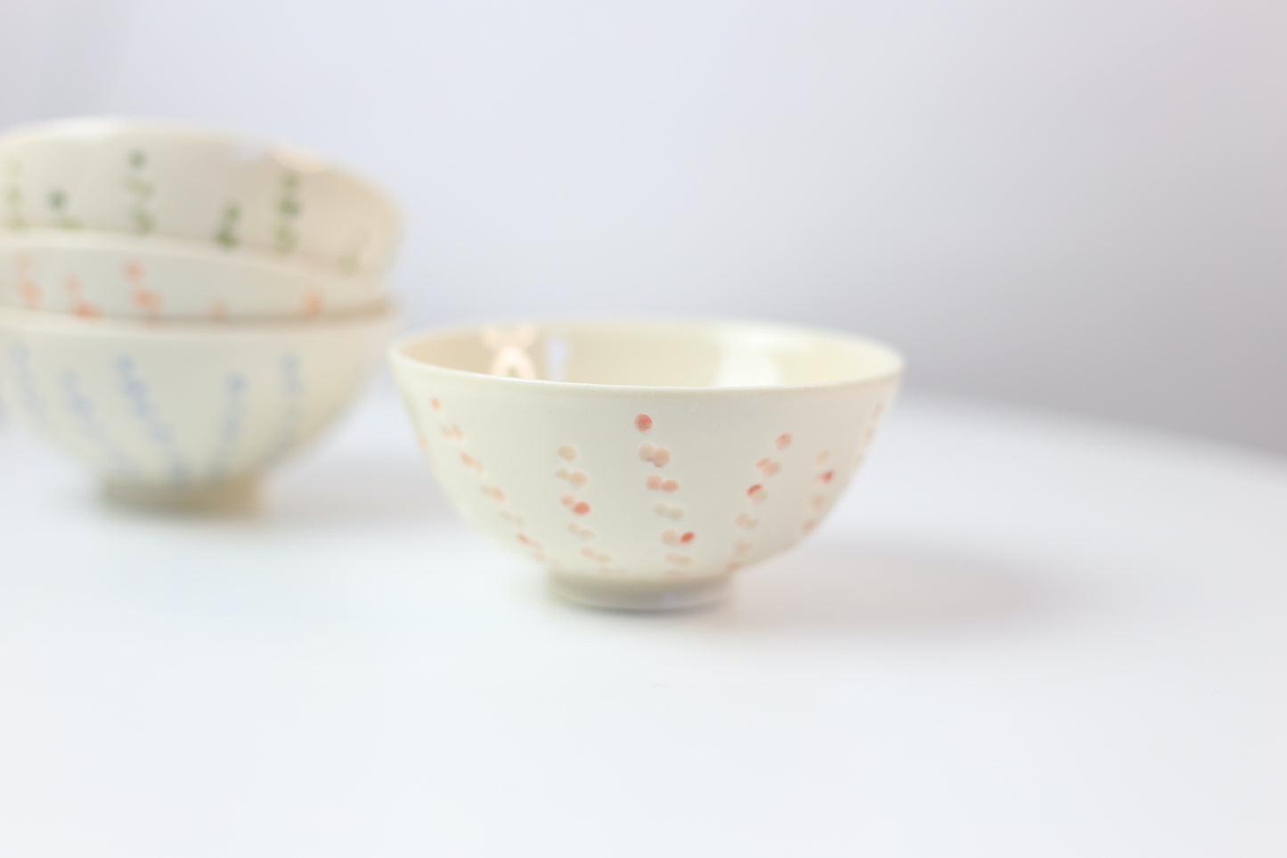 Hand-carved and painted mini porcelain bowl