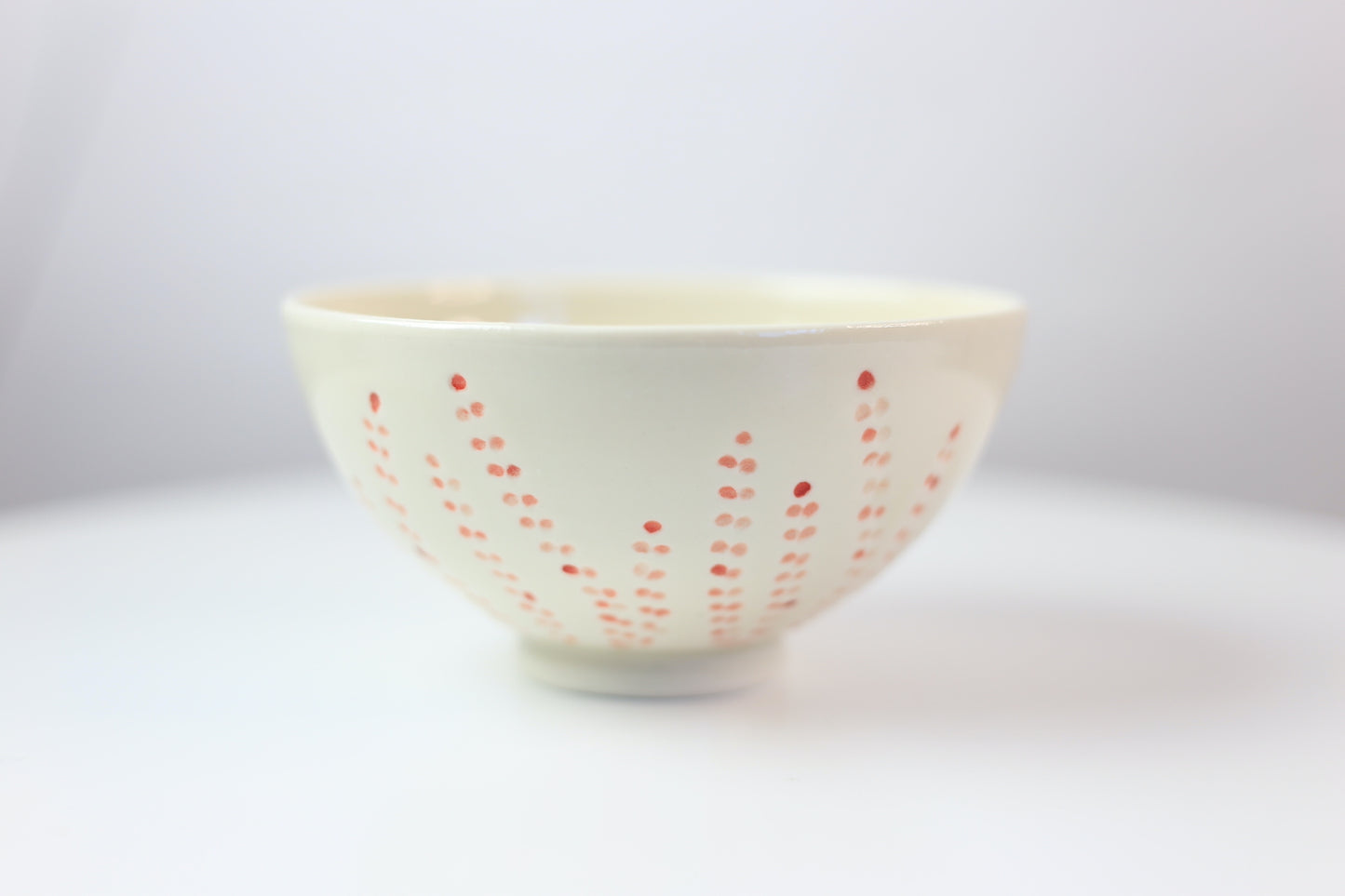 Hand-carved and painted medium porcelain bowl