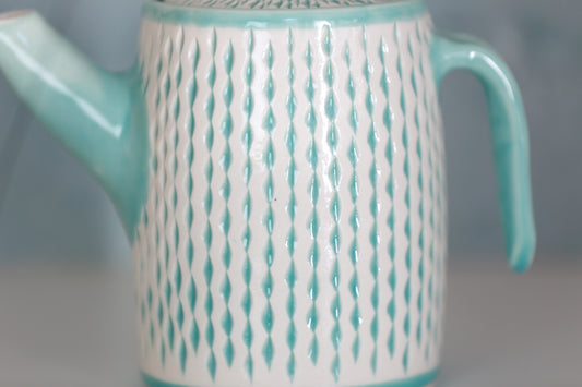 Large Porcelain teapot with carvings in turquoise