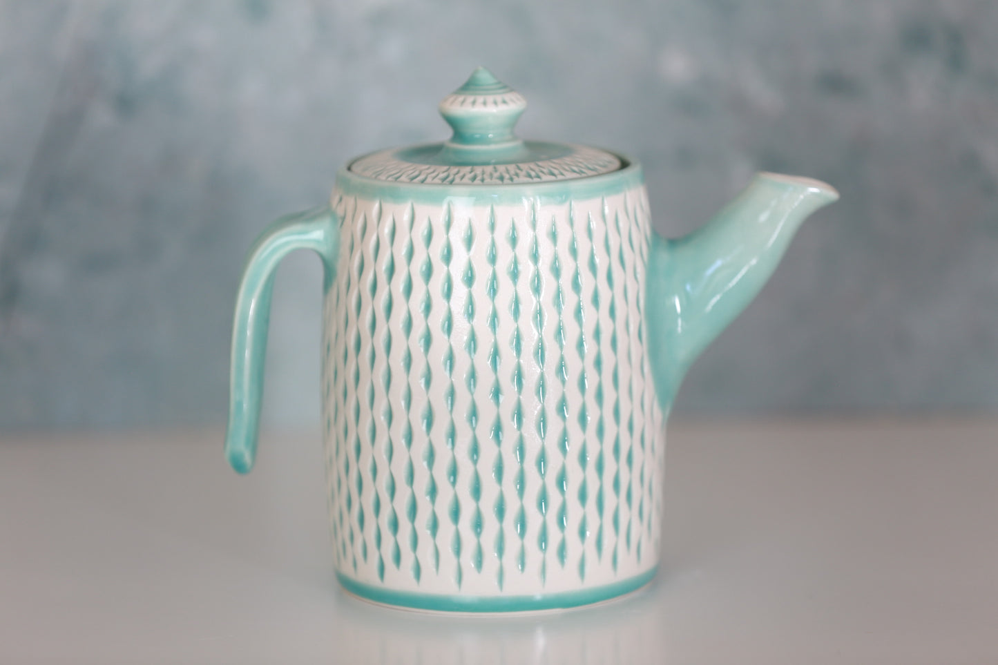 Large Porcelain teapot with carvings in turquoise
