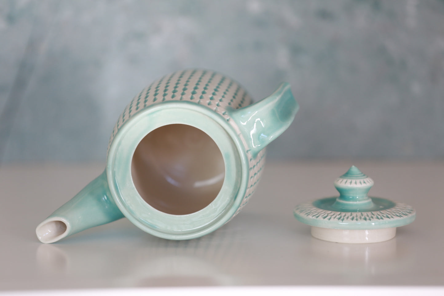 Large Porcelain teapot with carvings in turquoise