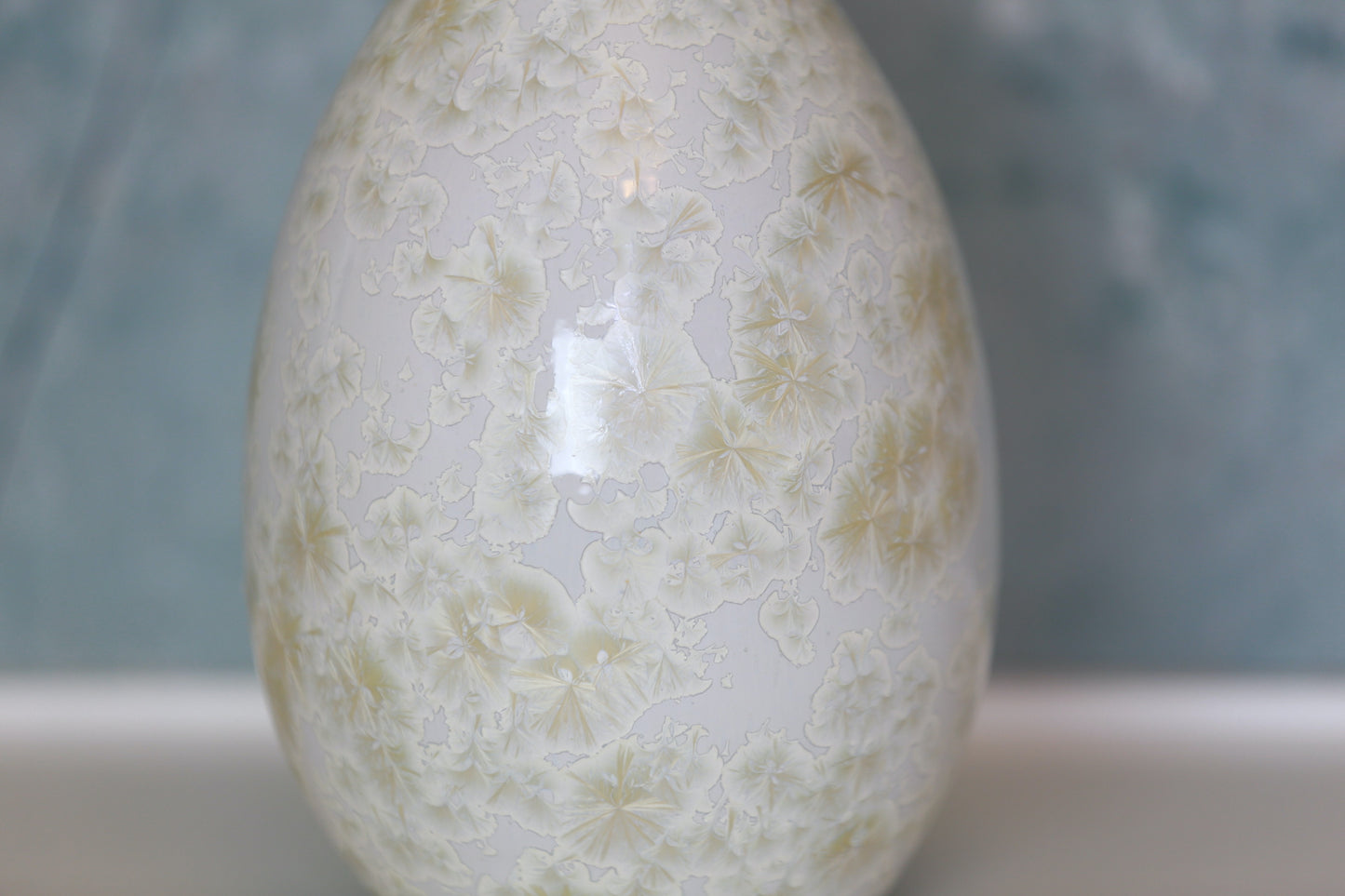 Large bud vase with lavender hue and gold crystals
