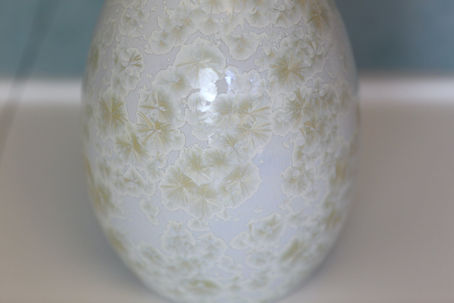 Large bud vase with lavender hue and gold crystals