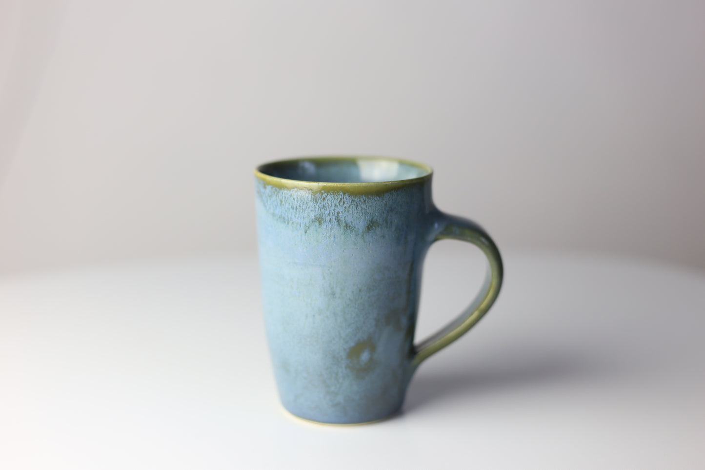 Elegant 8-10 oz stoneware mug in blue green