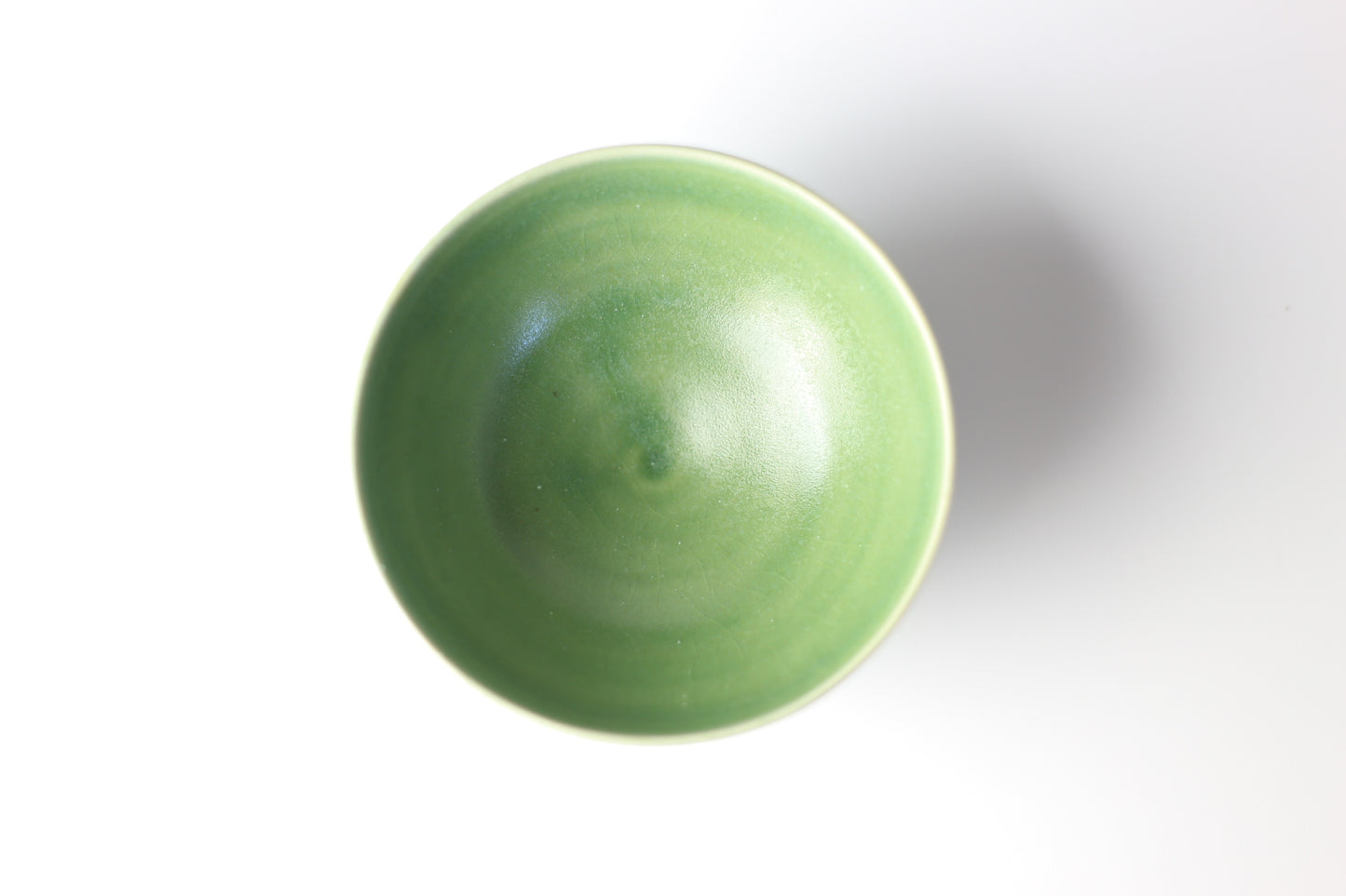 Small green stoneware bowl with chattering design #50