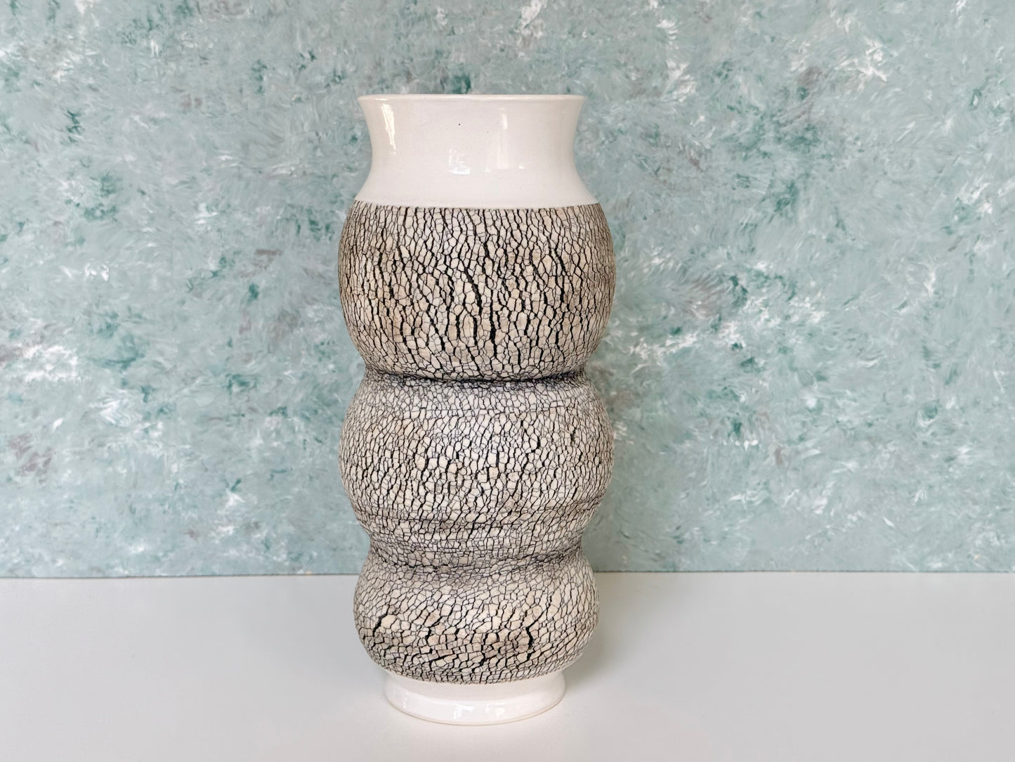 Tall Porcelain Vase with Texture and Multiple Curves in White