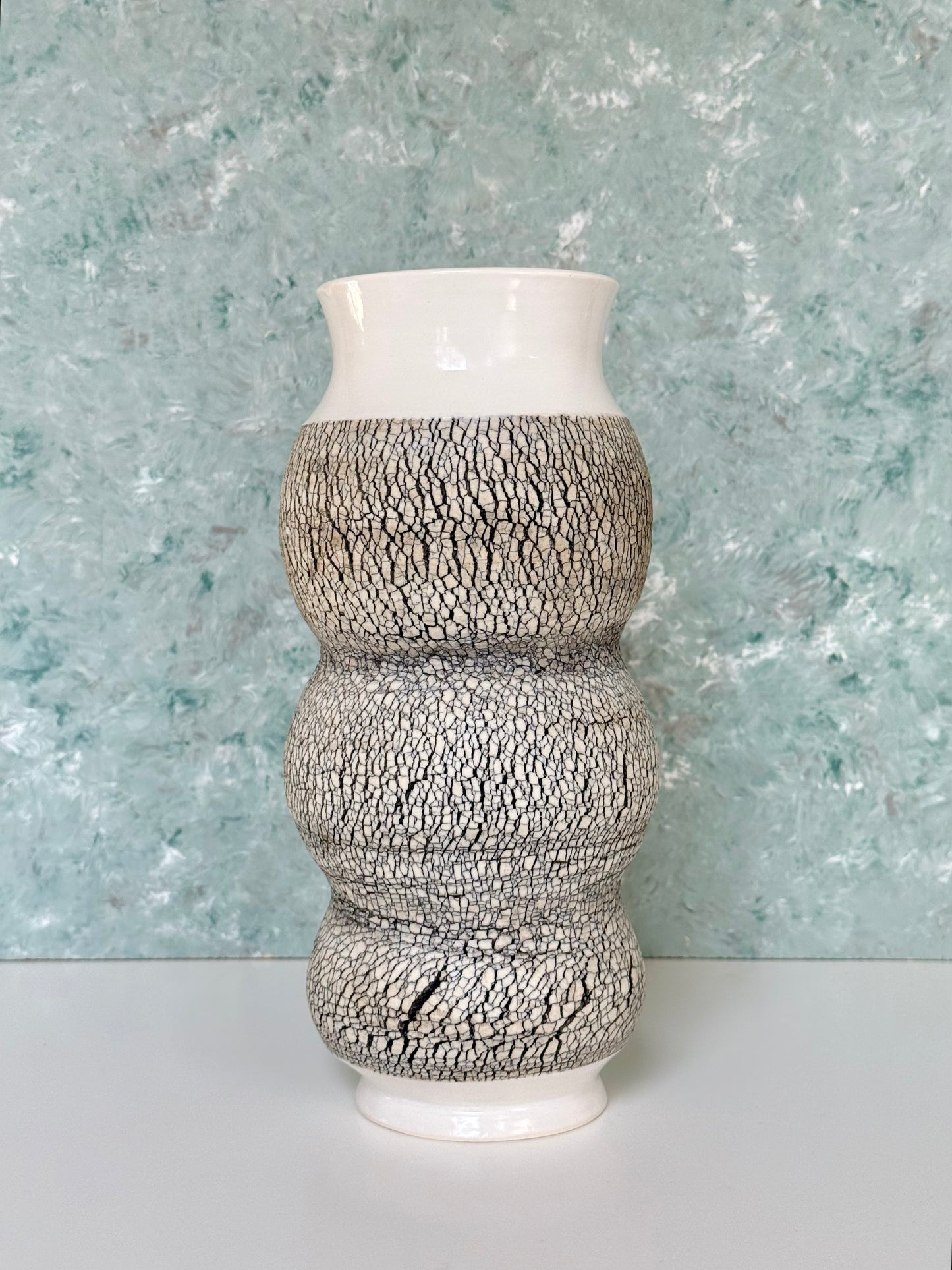 Tall Porcelain Vase with Texture and Multiple Curves in White