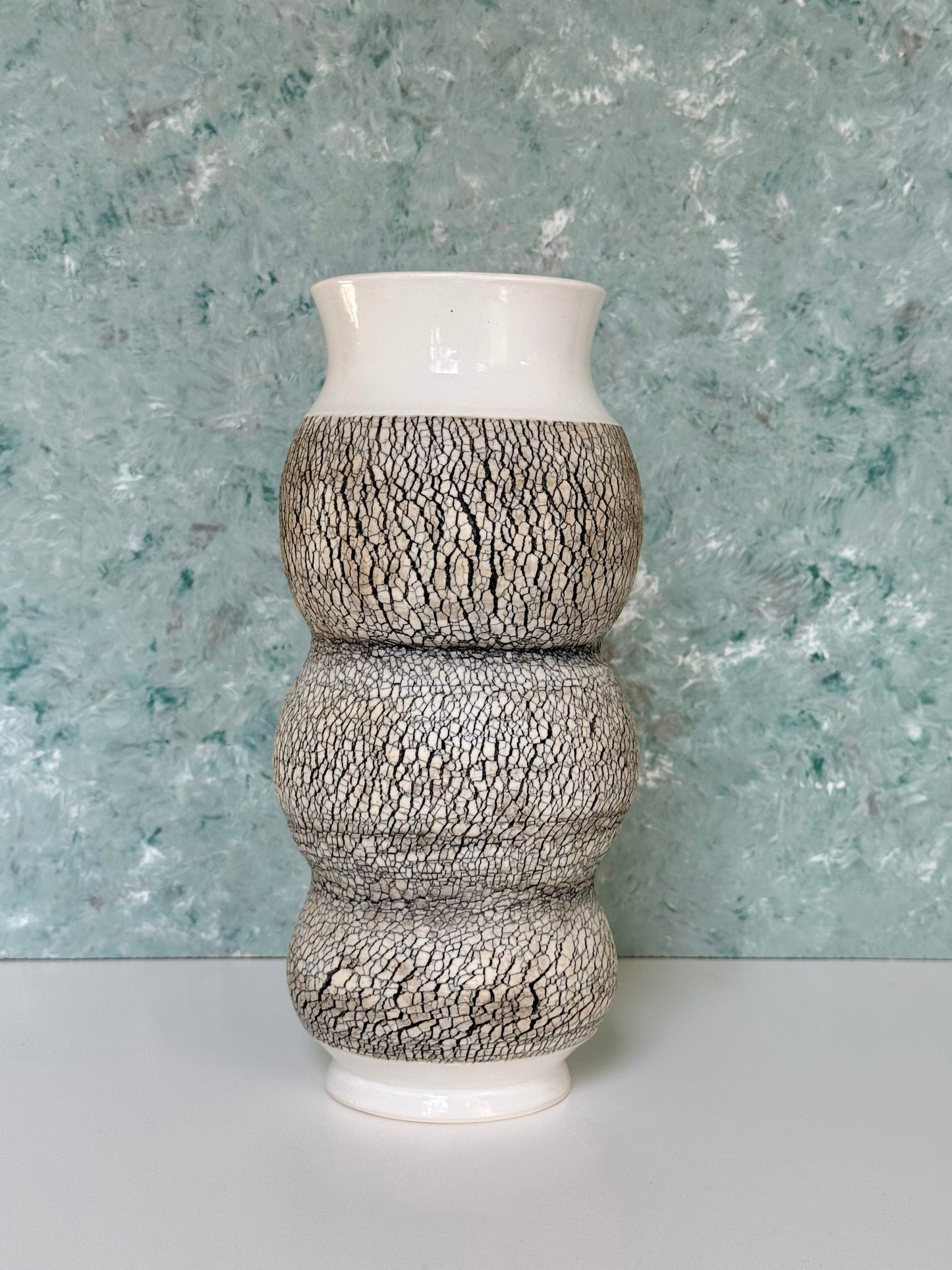Tall Porcelain Vase with Texture and Multiple Curves in White
