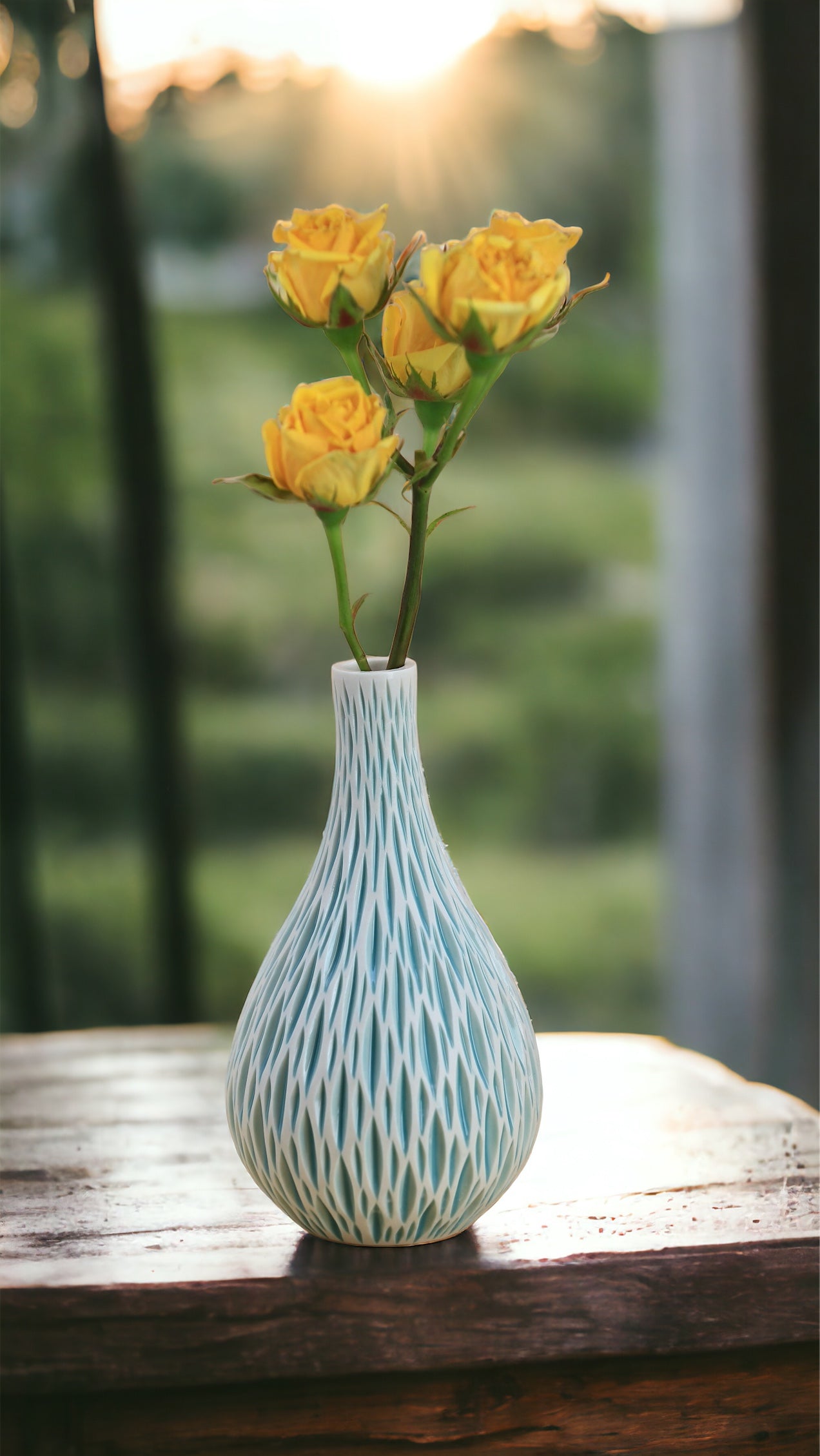 Tall porcelain bud vase with geometric carvings in turquoise white