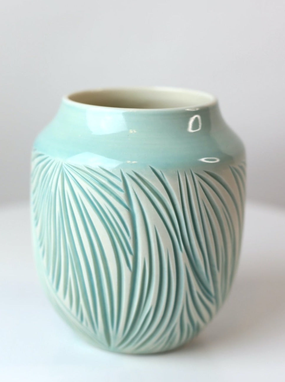 Porcelain vase with abstract carvings in turquoise