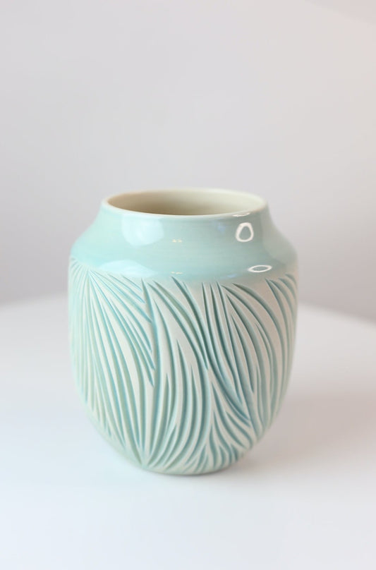 Porcelain vase with abstract carvings in turquoise