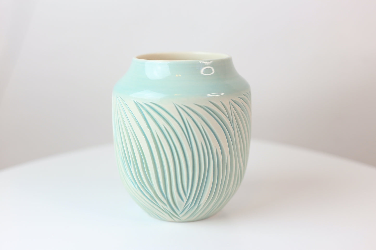 Porcelain vase with abstract carvings in turquoise