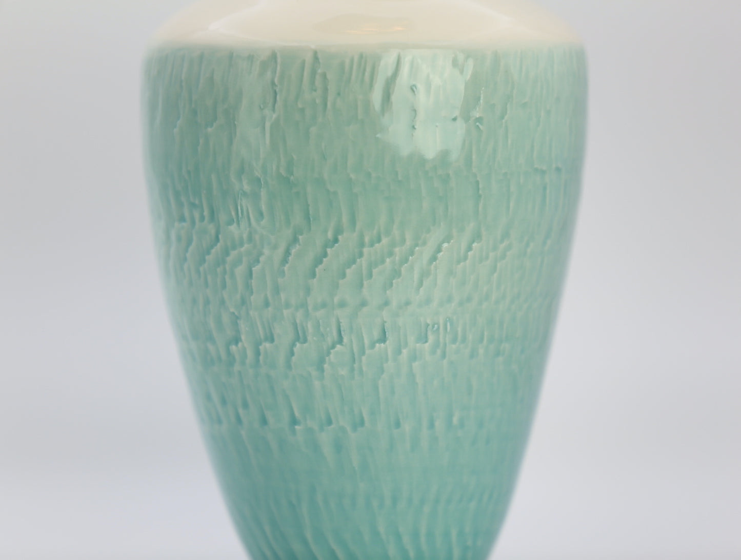 Porcelain vase with texture in turquoise white