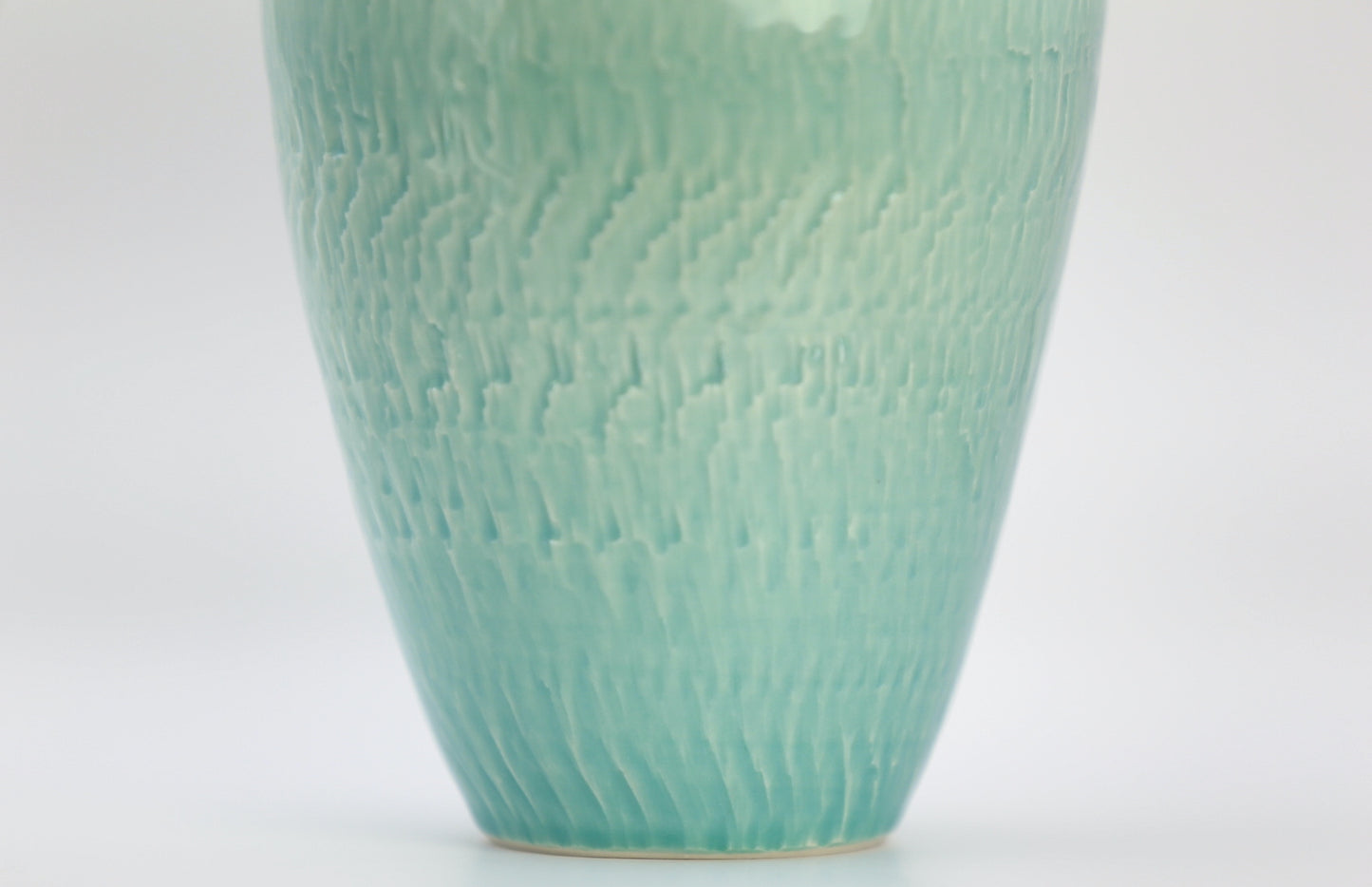Porcelain vase with texture in turquoise white