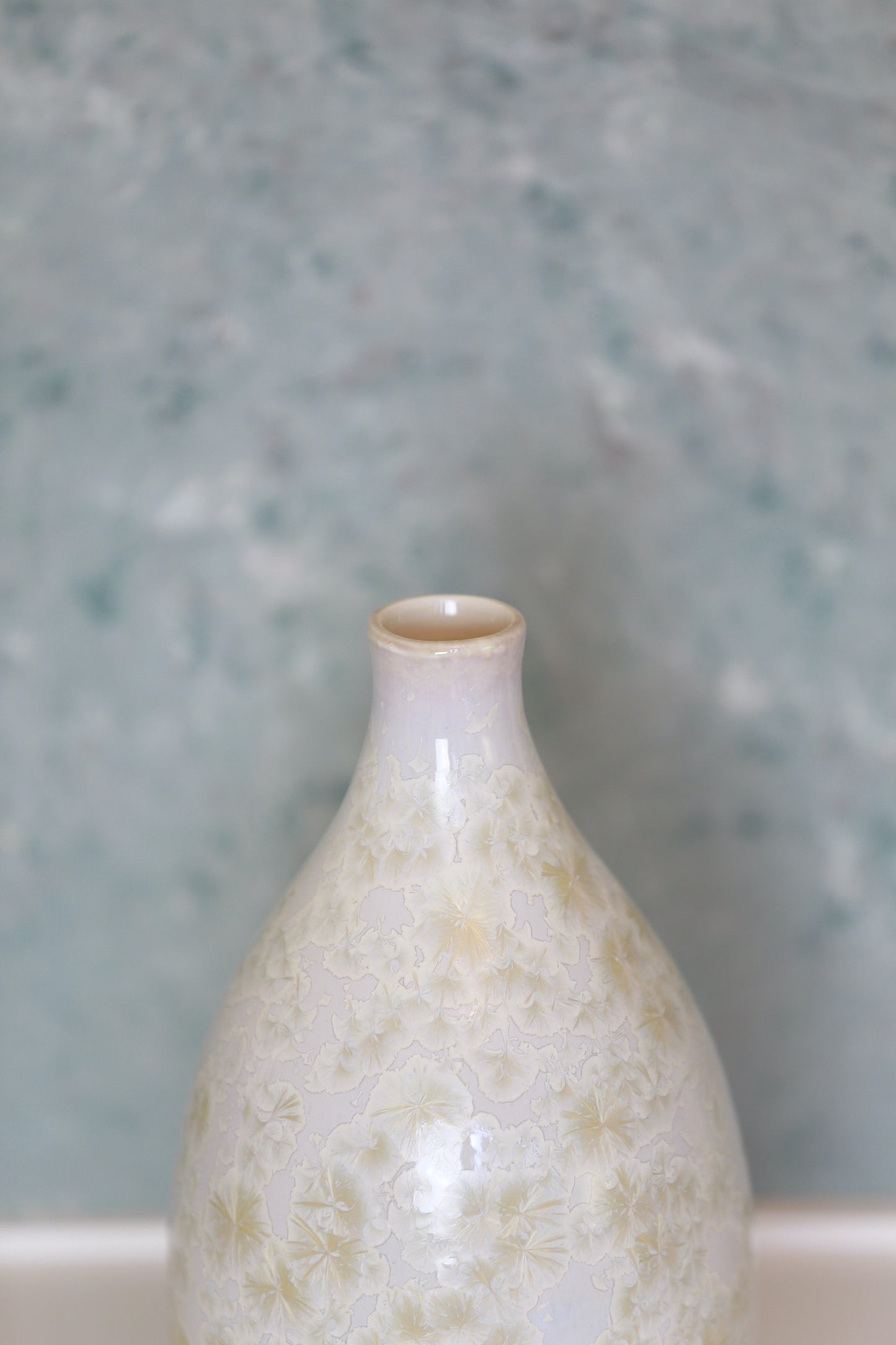 Large bud vase with lavender hue and gold crystals