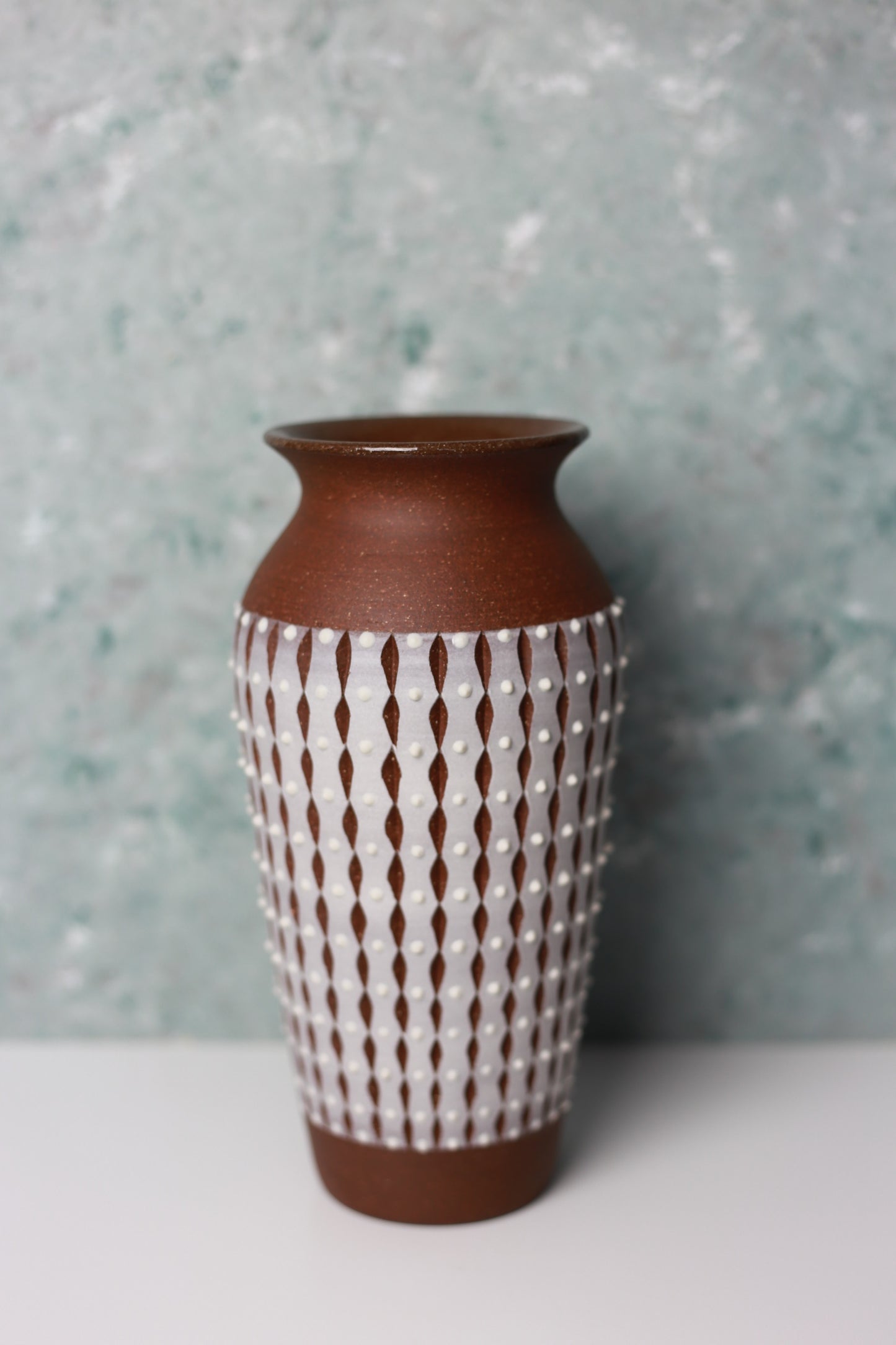 Ceramic Vase with Carved and Dotted Design in Brown