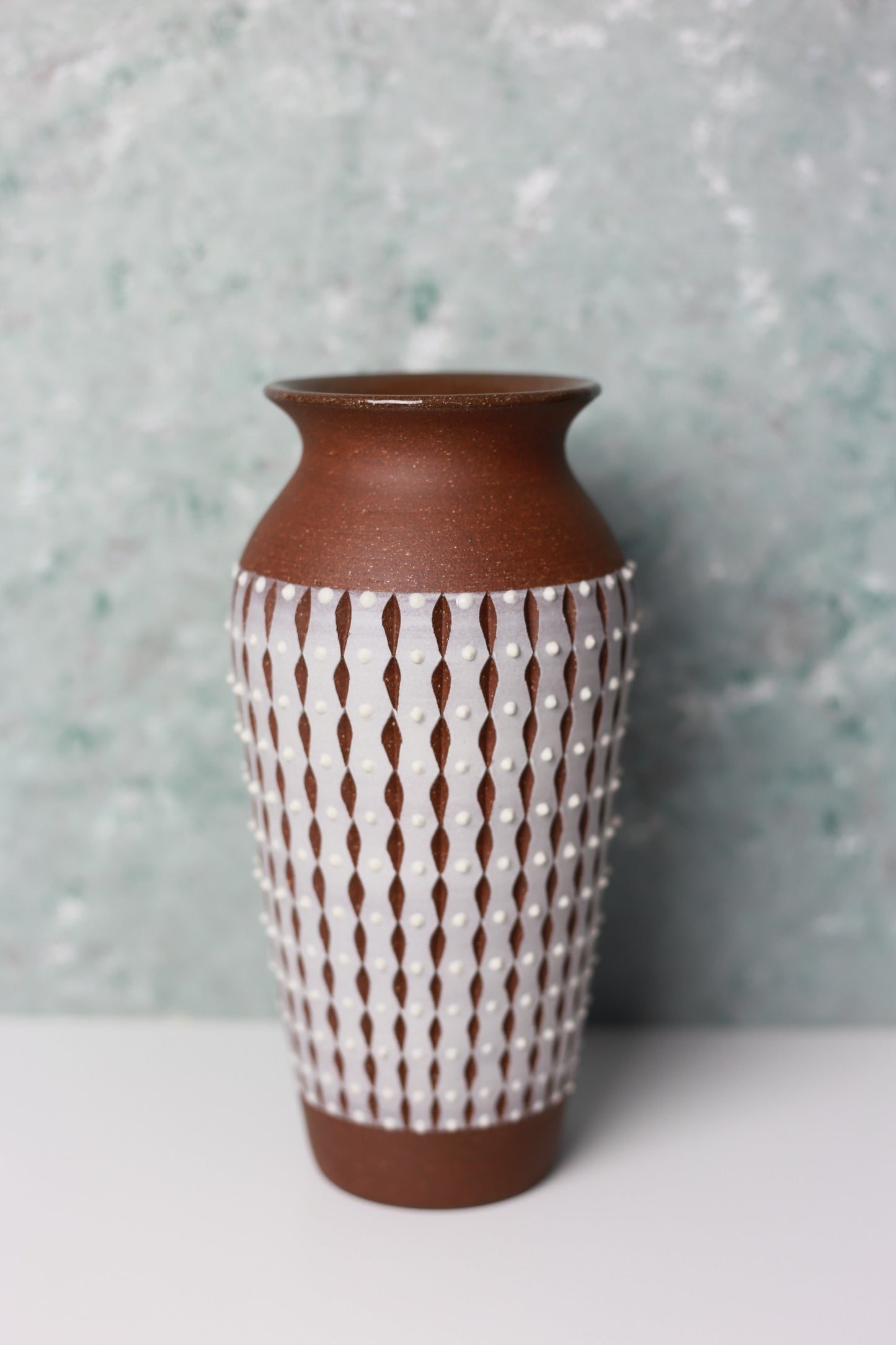 Ceramic Vase with Carved and Dotted Design in Brown