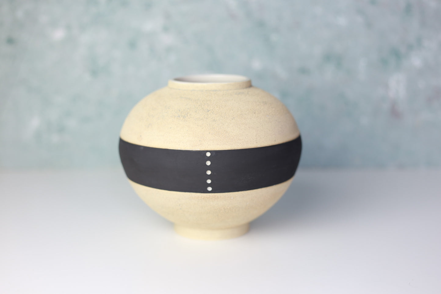 Round Porcelain Vase with Sandy Texture in Beige and Black