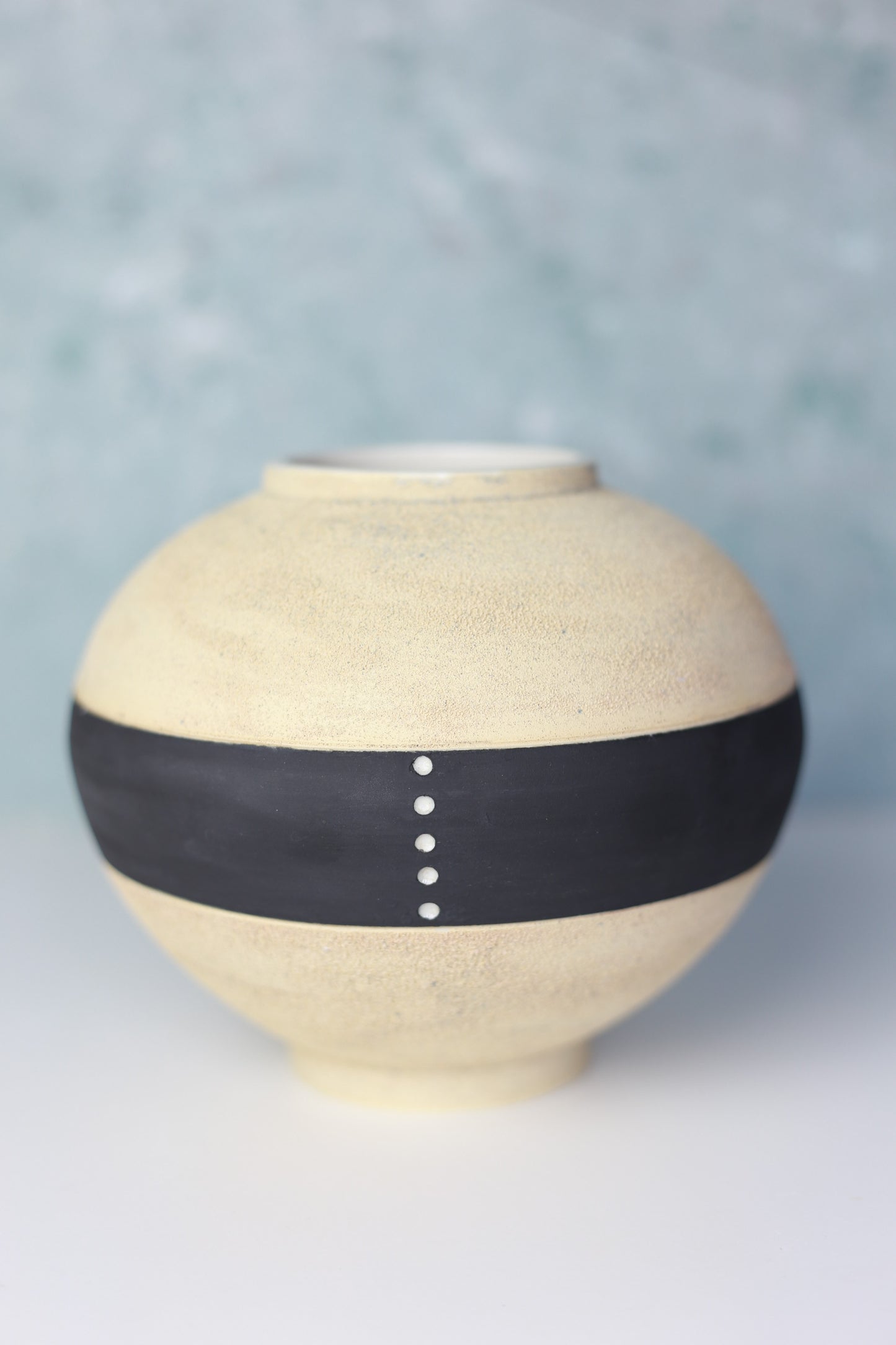 Round Porcelain Vase with Sandy Texture in Beige and Black
