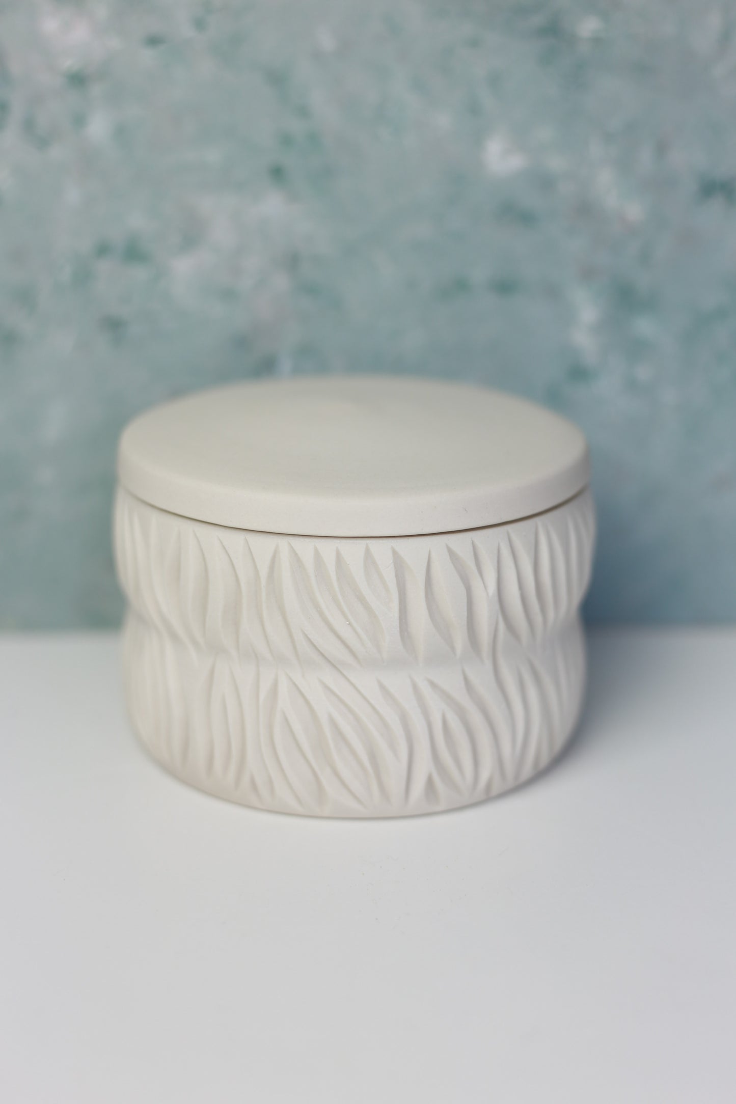 White and Blue Porcelain Jar with Carvings
