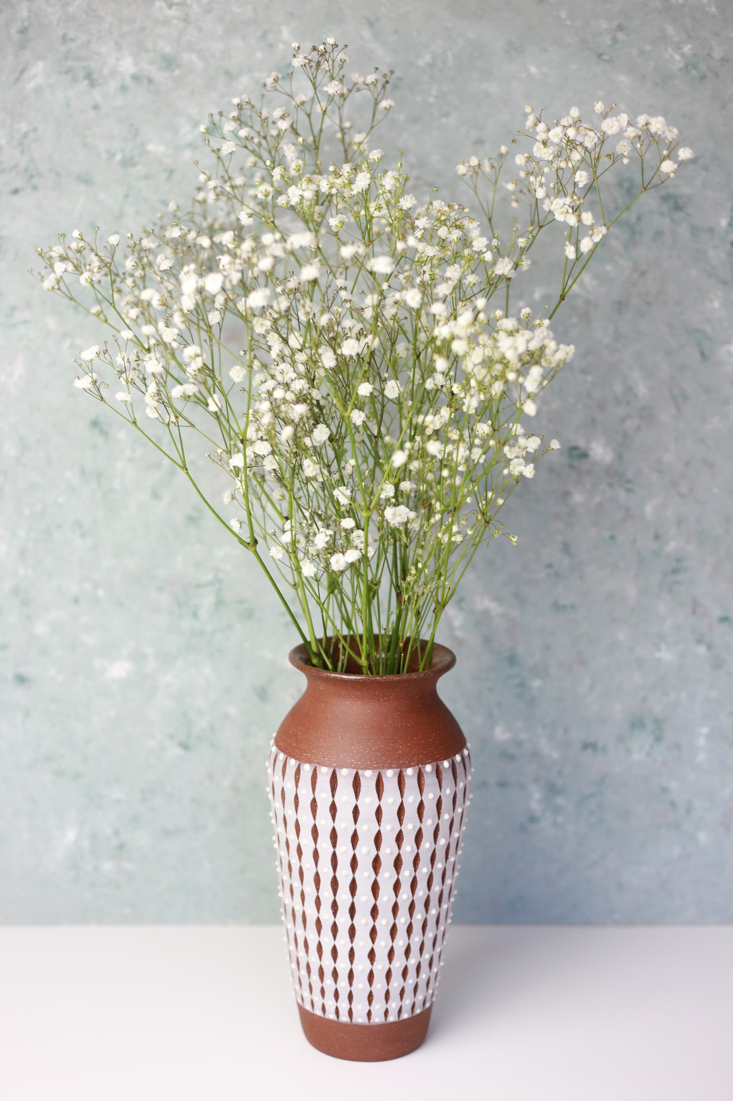 Ceramic Vase with Carved and Dotted Design in Brown