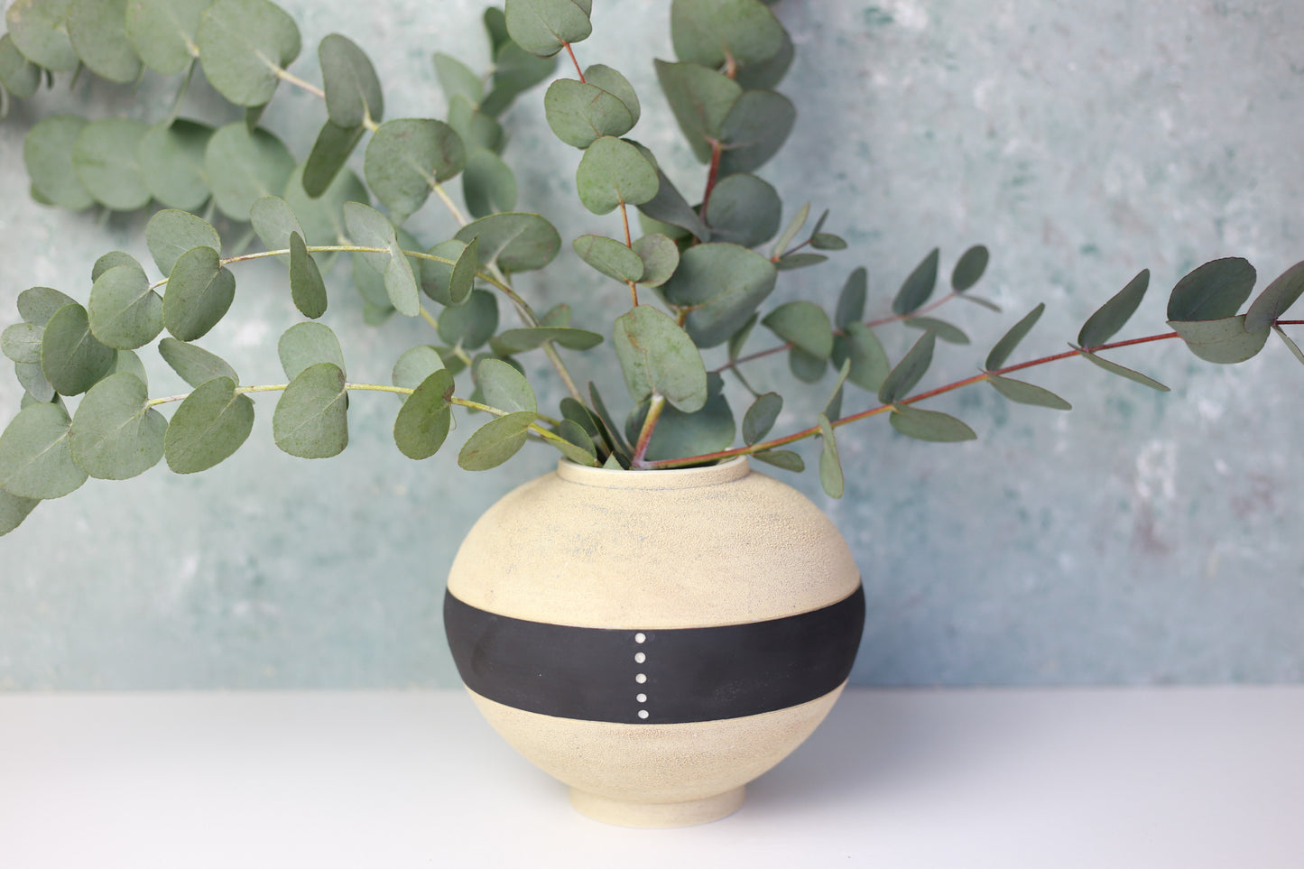 Round Porcelain Vase with Sandy Texture in Beige and Black